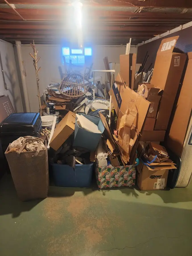 Roll-off dumpster container at job site for Roll Off Dumpster Rental in Grand Haven